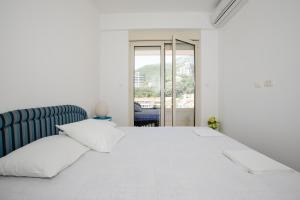 Postel nebo postele na pokoji v ubytování Apartment with sea view