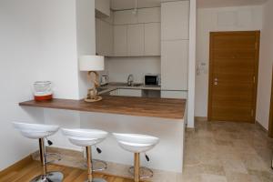 Kuchyň nebo kuchyňský kout v ubytování Apartment with sea view