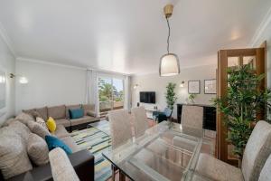 TV a/nebo společenská místnost v ubytování Grand Residence I by An Island Apart