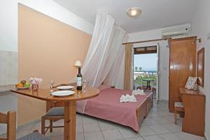 Postel nebo postele na pokoji v ubytování Theodosia Apartments