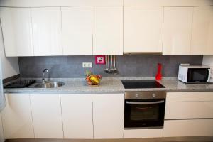 A kitchen or kitchenette at Casa Mamalola