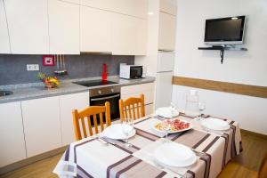 A kitchen or kitchenette at Casa Mamalola