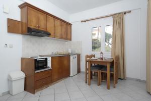 Kuchyň nebo kuchyňský kout v ubytování Theodosia Apartments + 12 fotografií