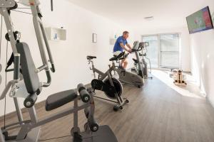 Das Fitnesscenter und/oder die Fitnesseinrichtungen in der Unterkunft Appartement "Karat" mit Penthouseflair - Oase am Haff