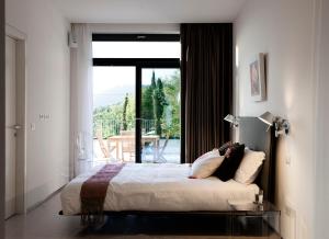 Postel nebo postele na pokoji v ubytování B&B Casa Colleverde + 23 fotografií