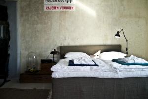 Ένα ή περισσότερα κρεβάτια σε δωμάτιο στο Speicher7 Hotel