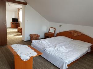 Postel nebo postele na pokoji v ubytování Guest House Boba