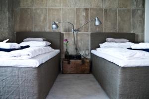 Ένα ή περισσότερα κρεβάτια σε δωμάτιο στο Speicher7 Hotel