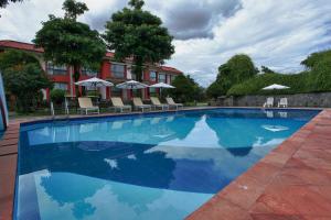 The swimming pool at or near Hotel Pokhara Grande