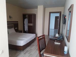 Postel nebo postele na pokoji v ubytování Hotel 725 B