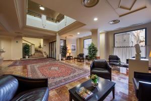 a living room with couches and a table at Best Western Hotel Stella d'Italia in Marsala