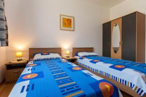 Posteľ alebo postele v izbe v ubytovaní Apartments Belavic by El-Pi Tours