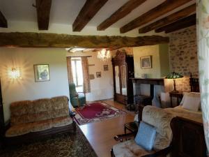 Posezení v ubytování L'Ancien Presbytère Chambres D'hote ou Gite