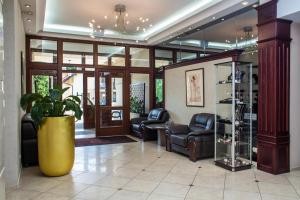 Posezení v ubytování Hotel Rigga