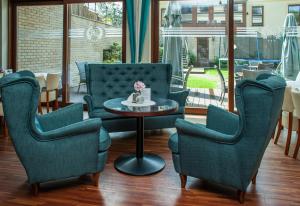 Posezení v ubytování Hotel Rigga
