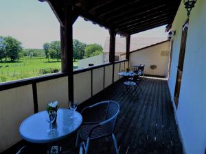 Posezení v ubytování L'Ancien Presbytère Chambres D'hote ou Gite