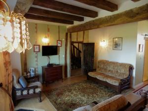 Posezení v ubytování L'Ancien Presbytère Chambres D'hote ou Gite