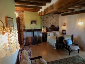 Postel nebo postele na pokoji v ubytování L'Ancien Presbytère Chambres D'hote ou Gite