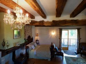 Postel nebo postele na pokoji v ubytování L'Ancien Presbytère Chambres D'hote ou Gite