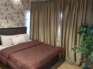 Ένα ή περισσότερα κρεβάτια σε δωμάτιο στο Castle Hostel