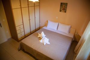 Katil atau katil-katil dalam bilik di La casa d'estate