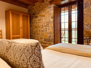 Postel nebo postele na pokoji v ubytování Casa Lixa Hotel Rural Albergue