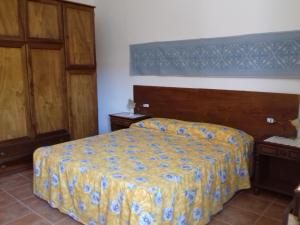 A bed or beds in a room at Canne Al Vento