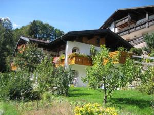 a house with a balcony on the side of it at Haus Marent in Bartholomäberg