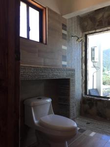 A bathroom at Chalet Nativo - Fabulous Terrace & Vineyard