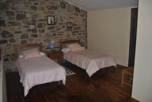 Ένα ή περισσότερα κρεβάτια σε δωμάτιο στο El Pozo