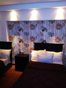 Ένα ή περισσότερα κρεβάτια σε δωμάτιο στο Castle Hostel
