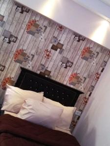Ένα ή περισσότερα κρεβάτια σε δωμάτιο στο Castle Hostel