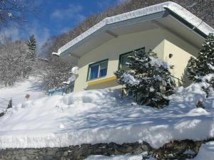 Ferienhaus Grappa v zimě