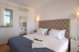 Posteľ alebo postele v izbe v ubytovaní Golden Sand Paros