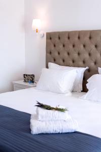 Posteľ alebo postele v izbe v ubytovaní Golden Sand Paros