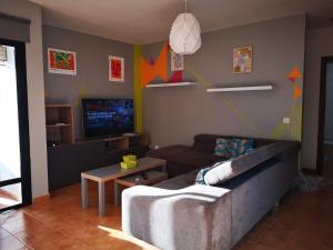 Telewizja i/lub zestaw kina domowego w obiekcie Lau Haizeta Beach