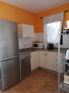 Kuchnia lub aneks kuchenny w obiekcie Lau Haizeta Beach