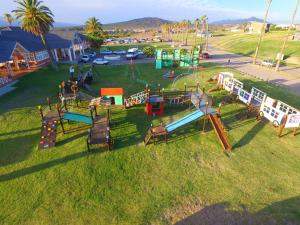 an aerial view of a playground in a park at Del Bono Beach Complejo Bahia in Las Tapias