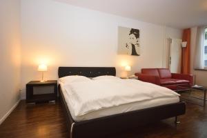 Postel nebo postele na pokoji v ubytování Fantastic Studio near Lake - Flower 02