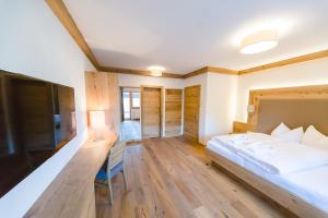 Posteľ alebo postele v izbe v ubytovaní Hotel Giessenbach