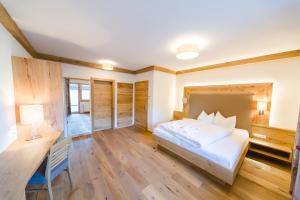 Posteľ alebo postele v izbe v ubytovaní Hotel Giessenbach