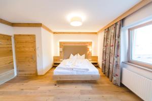Posteľ alebo postele v izbe v ubytovaní Hotel Giessenbach