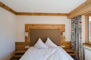 Posteľ alebo postele v izbe v ubytovaní Hotel Giessenbach