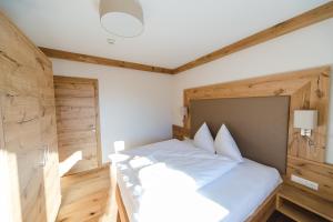 Posteľ alebo postele v izbe v ubytovaní Hotel Giessenbach