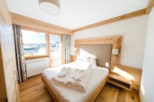 Posteľ alebo postele v izbe v ubytovaní Hotel Giessenbach