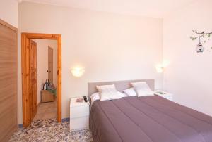 Postel nebo postele na pokoji v ubytování Hotel Costa Citara