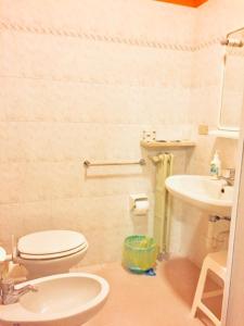 Een badkamer bij Hotel La Favorita