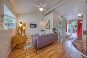 a living room with a couch and a chair at Cottage By Mission Bay in San Diego