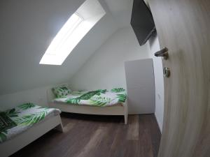 Postel nebo postele na pokoji v ubytování Jack's Apartments