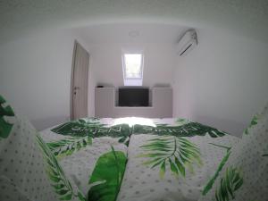 Postel nebo postele na pokoji v ubytování Jack's Apartments